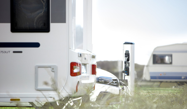 GARO is launching the first post with power outlets for both electric vehicle charging and camping needs.